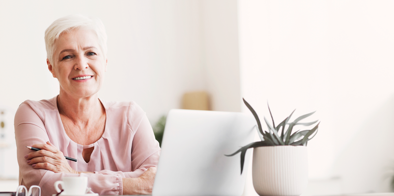 old-lady-posing-workdesk-home