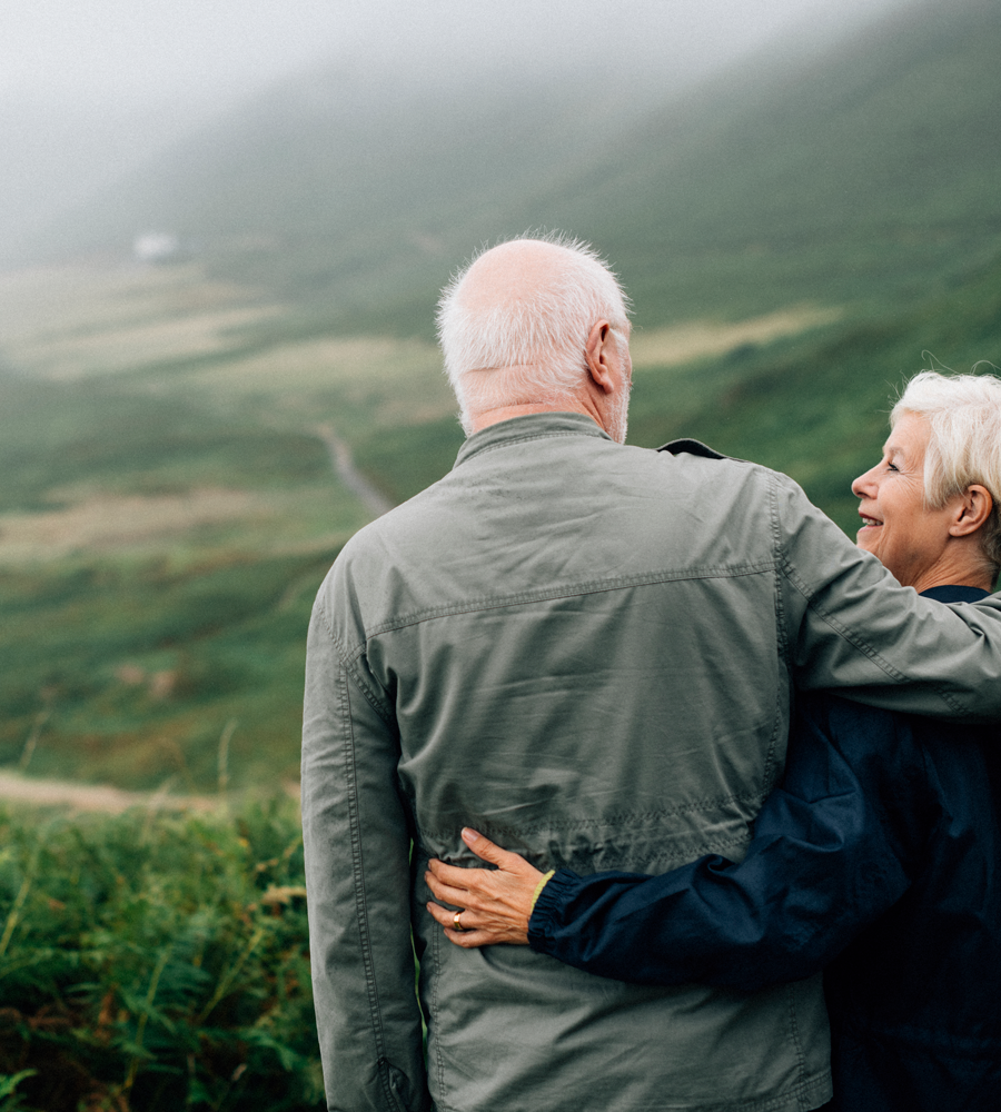 happy-senior-couple-enjoying-breathtaking-view